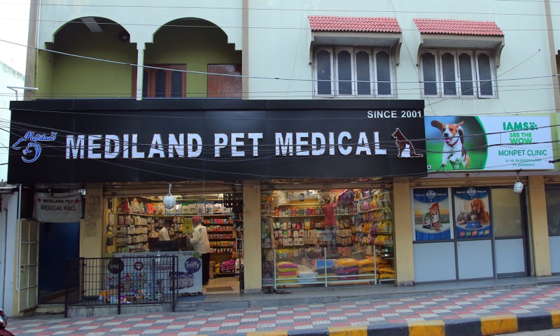 Mediland Pet Medical shopfront on St. Ann's High School Road, with the 'Since 2001' sign above shelves of pet food.